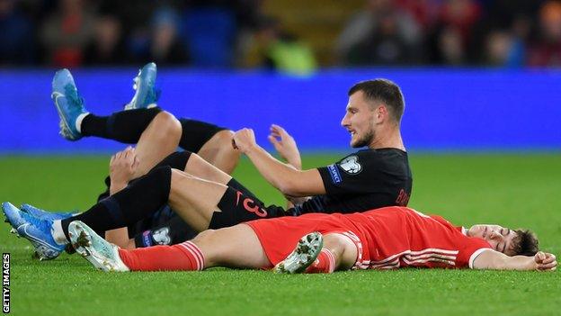 Wales winger Daniel James suffered a heavy collision with Domagoj Vida and Borna Barisic of Croatia