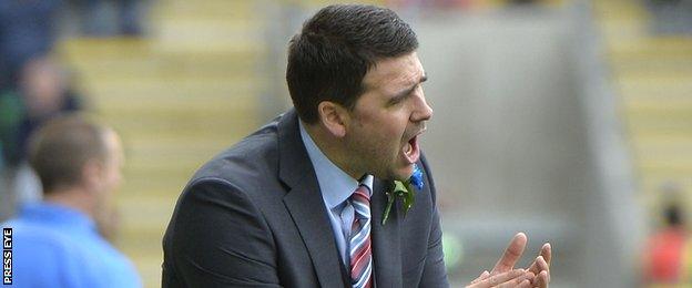 David Healy applauds his team during Saturday's Irish Cup final