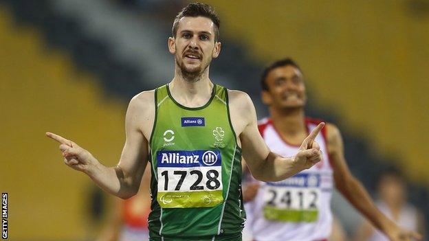 Michael McKillop celebrates as he retains his T38 800m world title in Doha