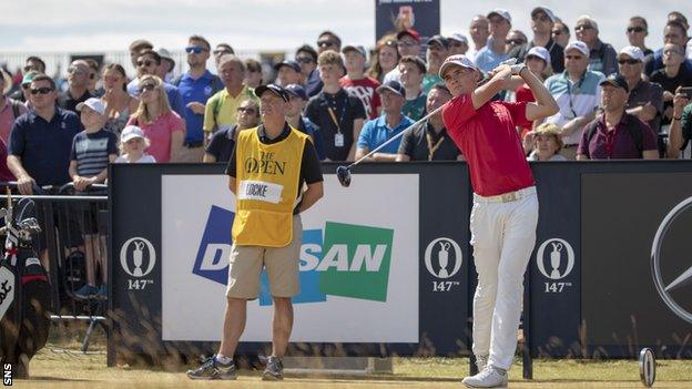 Scotland's Sam Locke tees off on the 18th at Carnoustie