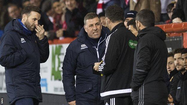 Motherwell assistant boss James McFadden (left) and manager Mark McGhee (centre)