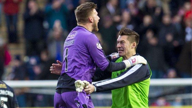 Falkirk's Danny Rogers (left) celebrates at the final whistle