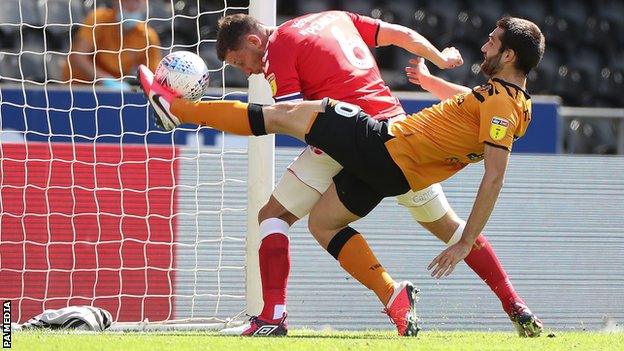 Jason Pearce scores for Charlton at Hull