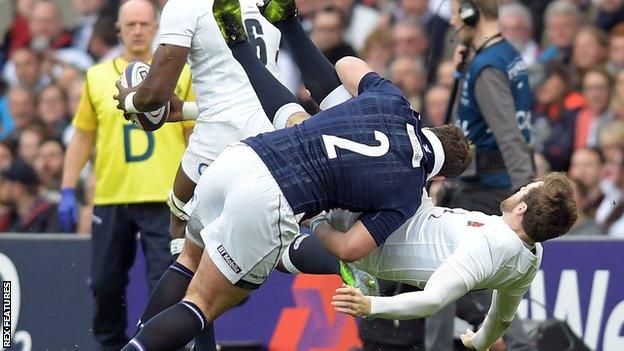 Scotland's Fraser Brown upends England's Elliot Daly