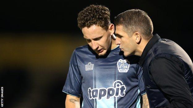 Callum McFadzean (left) joins Will Aimson, Danny Mayor and Dom Telford in joining former Bury boss Ryan Lowe (right) at Plymouth Argyle