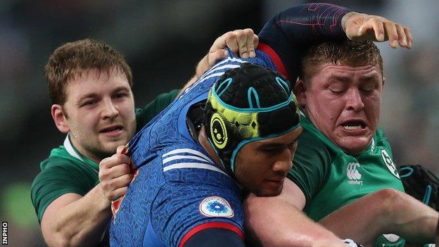 Iain Henderson (left) and Tadhg Furlong (right) battle with France's Sebastien Vahaamahina in the Six Nations game earlier this month