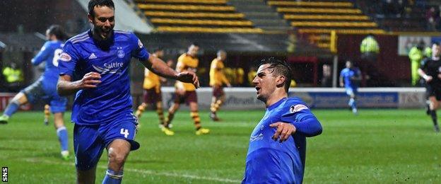 Andrew Considine runs to celebrate with Kenny McLean after his goal