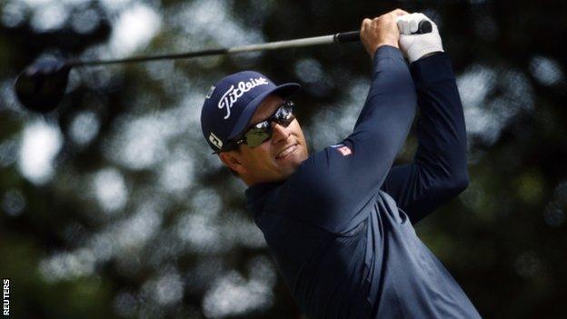 Adam Scott hits a drive