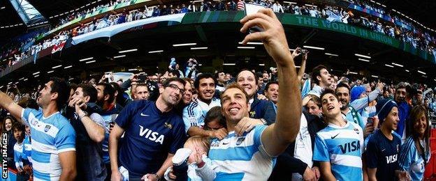 Argentina players takes selfies with fans after victory over Ireland at 2015 World Cup