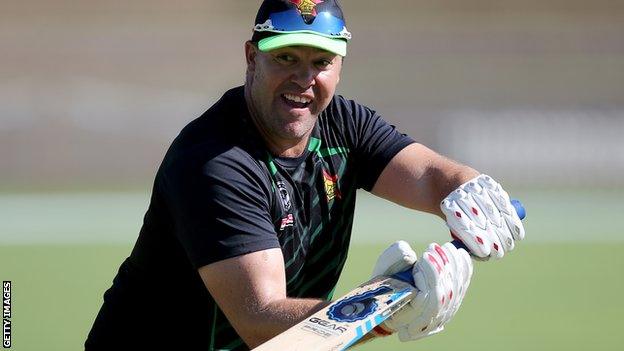 Heath Streak helps Zimbabwe with some catching practice during the World Cup Qualifier in March