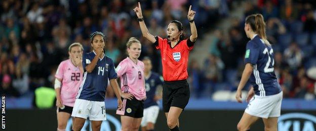 Referee calls for VAR review