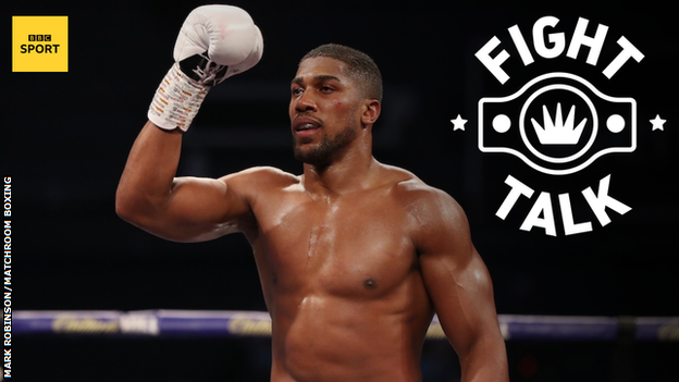 Anthony Joshua celebrates victory