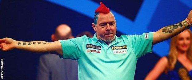 Peter Wright entertains the crowd with his walk-on routine