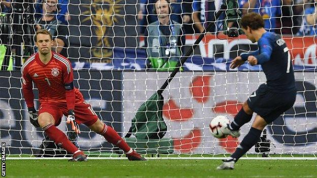 Antoine Griezmann scores from the penalty spot