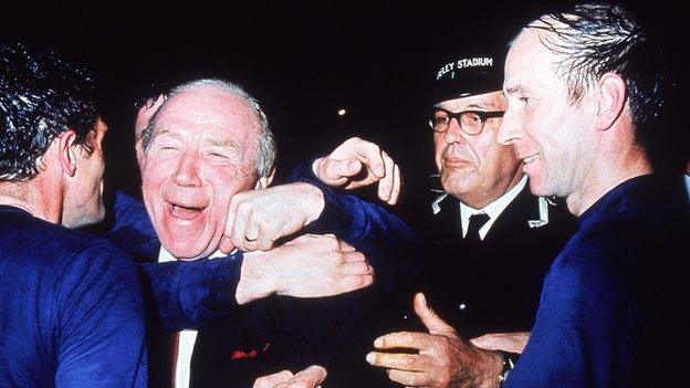 Matt Busby and Bobby Charlton celebrate