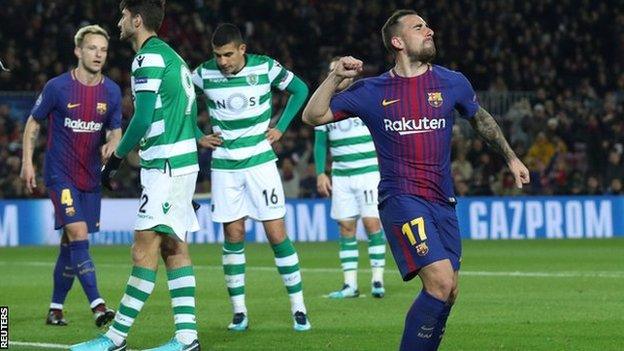 Barcelona's Paco Alcacer celebrates scoring against Sporting Lisbon