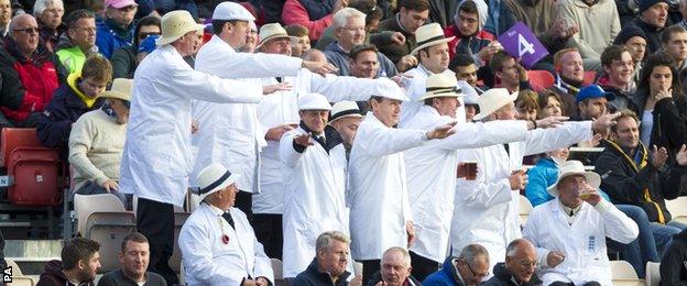 A group of fans dressed as umpires