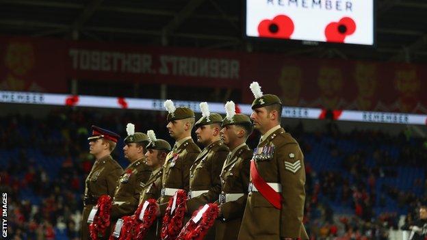 Remembrance is marked on the pitch ahead of Wales v Serbia