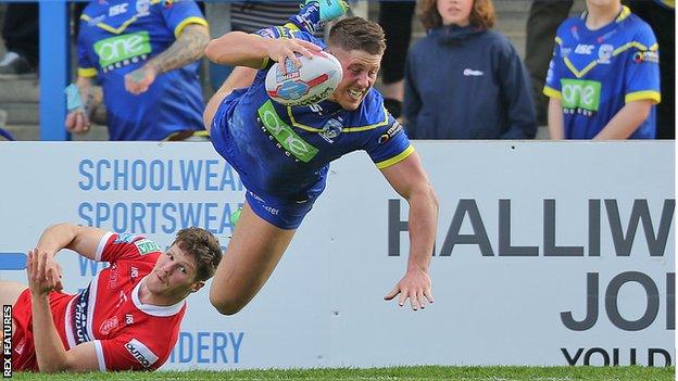 Warrington's Tom Linehan scores a try against Hull KR