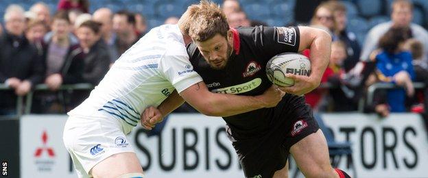 Ross Ford carries into contact for Edinburgh