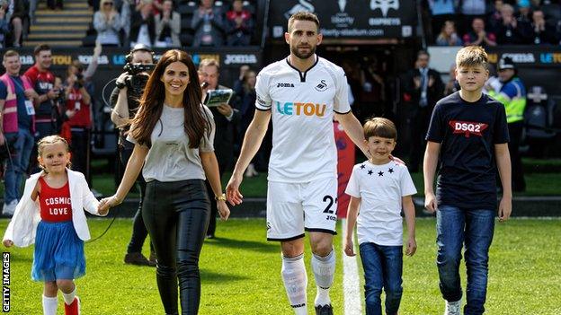 Rangel and his family walk out at the Liberty Stadium