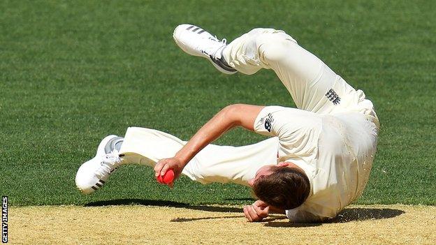 England's Jake Ball falls to the ground with an ankle injury