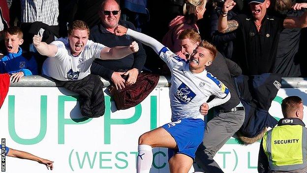 Harvey Gilmour celebrates scoring the winner against Morecambe