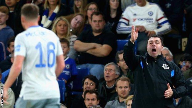 David Unsworth (left) shouts instructions from the dug-out as Everton lose to Chelsea in the Carabao Cup