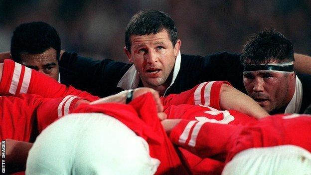 New Zealand captain Sean Fitzpatrick in the middle of the front row of the scrum against Wales in the 1995 World Cup