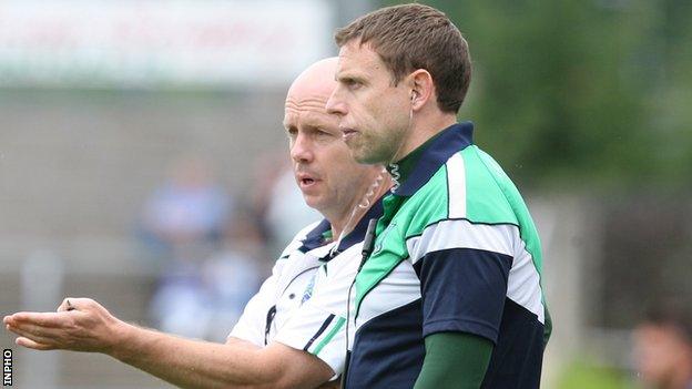 Peter Canavan talks to Kieran Donnelly during Fermanagh's All-Ireland qualifier against Cavan in 2012