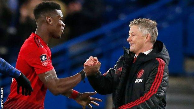 Paul Pogba with Manchester United manager Ole Gunnar Solskjaer