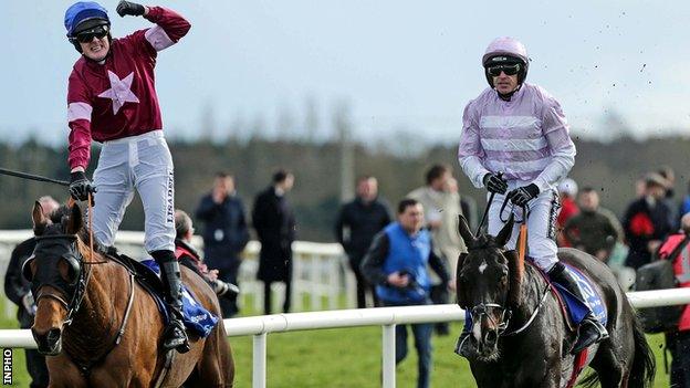 Ger Fox celebrates with Rogue Angel with Ruby Walsh behind on Bless The Wings