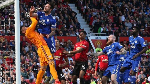 Neil Etheridge makes a save for Cardiff