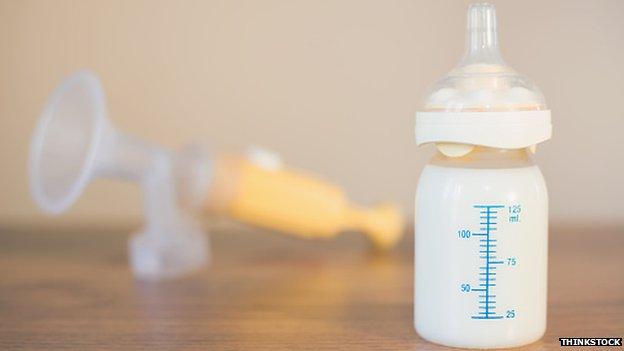 Breast pump and bottle of milk