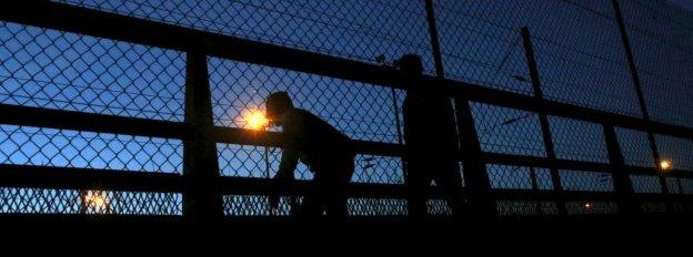 Migrants attempt to access the Channel Tunnel in Frethun, near Calais