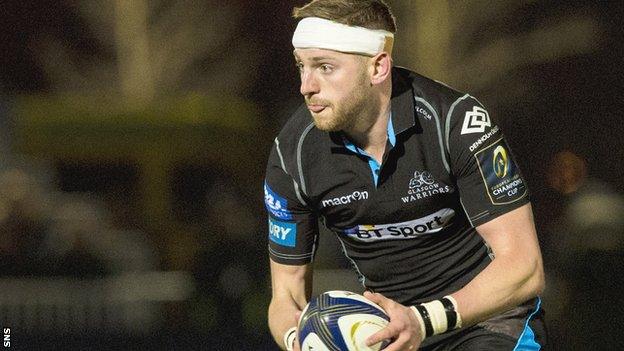 Finn Russell runs with the ball for Glasgow in their home victory over Racing 92 in December