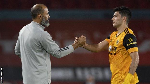 Nuno Espirito Santo with Raul Jimenez