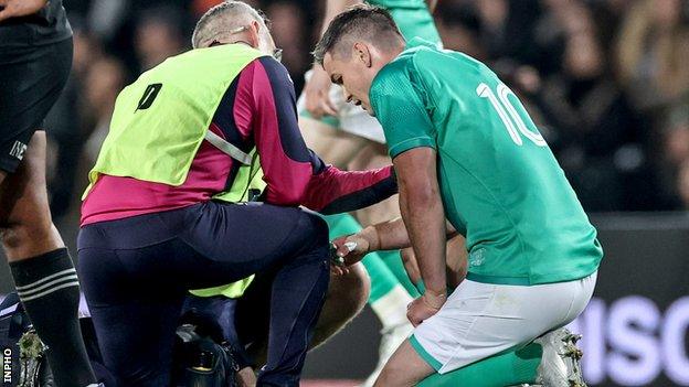 Johnny Sexton receives treatment at Eden Park