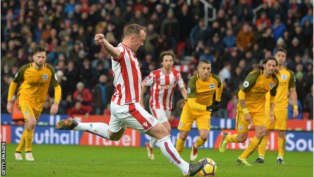 Charlie Adam takes a penalty