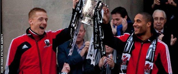 Garry Monk and Ashley Williams with the Capital One Cup in