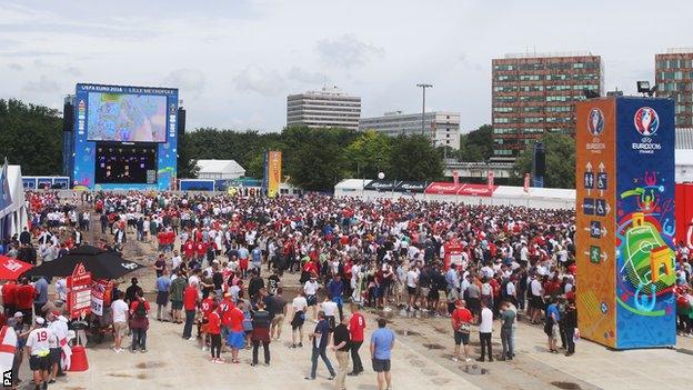 Fans in the fan zone in Lille ahead of the clash between England and Wales