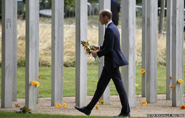 Britain's Prince William pays his respects