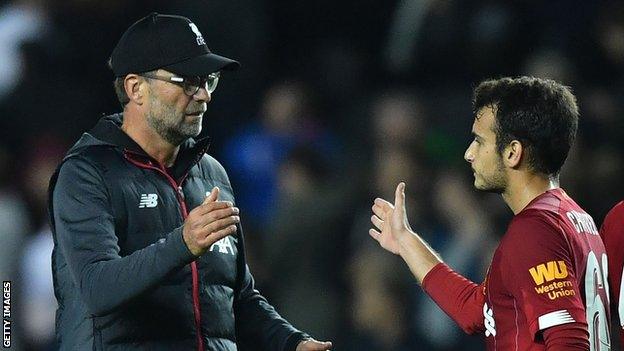 Liverpool manager Jurgen Klopp (left) and midfielder Pedro Chirivella