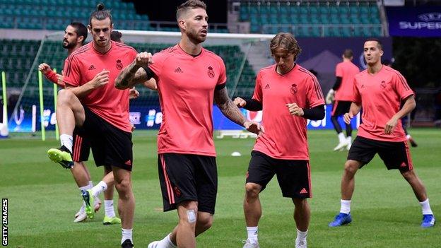 Bale and teammates including Sergio Ramos and Luka Modric stretching in Estonia during training session