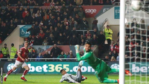 Joe Bryan scores Bristol City's opening goal against Manchester United