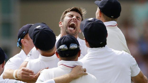 Mark Wood (centre) and England celebrate