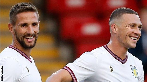 Conor Hourihane and Wales defender James Chester in action for Aston Villa