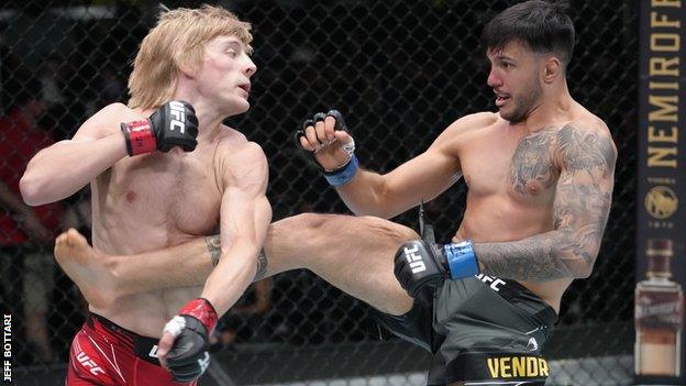 Luigi Vendramini of Brazil kicks Paddy Pimblett of England in their lightweight fight during the UFC Fight Night event at UFC APEX on September 04, 2021