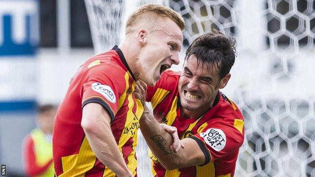 Scott Tiffoney (left) celebrates his late winner for Partick Thistle