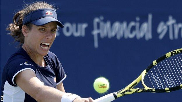 Johanna Konta hits a return at the Western and Southern Open